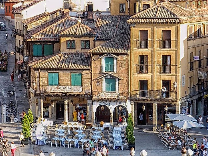 The everyday life of a cafe and street corner in the historic city of Segovia, just northwest of the capital Madrid.