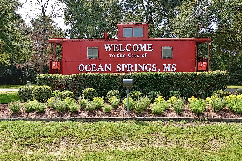 Sign welcoming visitors to Ocean Springs, Mississippi.