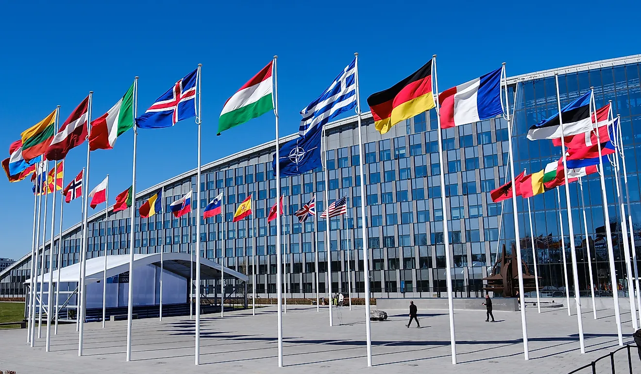The national flags of countries member of the NATO fly outside the organisation headquarters in Brussels, Belgium.